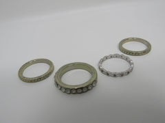 Designer Fashion Rings Lot of 4 Silver/Gold Small Clear Gems Female Adult Size 7 -- Used