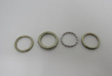 Designer Fashion Rings Lot of 4 Silver/Gold Small Clear Gems Female Adult Size 7 -- Used
