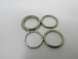 Designer Fashion Rings Lot of 4 Silver/Gold Small Clear Gems Female Adult Size 7 -- Used