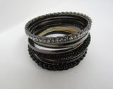 Designer Bangle Bracelet Set of 9 Black/Silver/Gold Female Adult -- Used