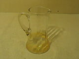 Standard Glass Pitcher 9in H x 5 3/4in Diameter Amber Glass -- Used