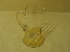 Standard Glass Pitcher 9in H x 5 3/4in Diameter Amber Glass -- Used