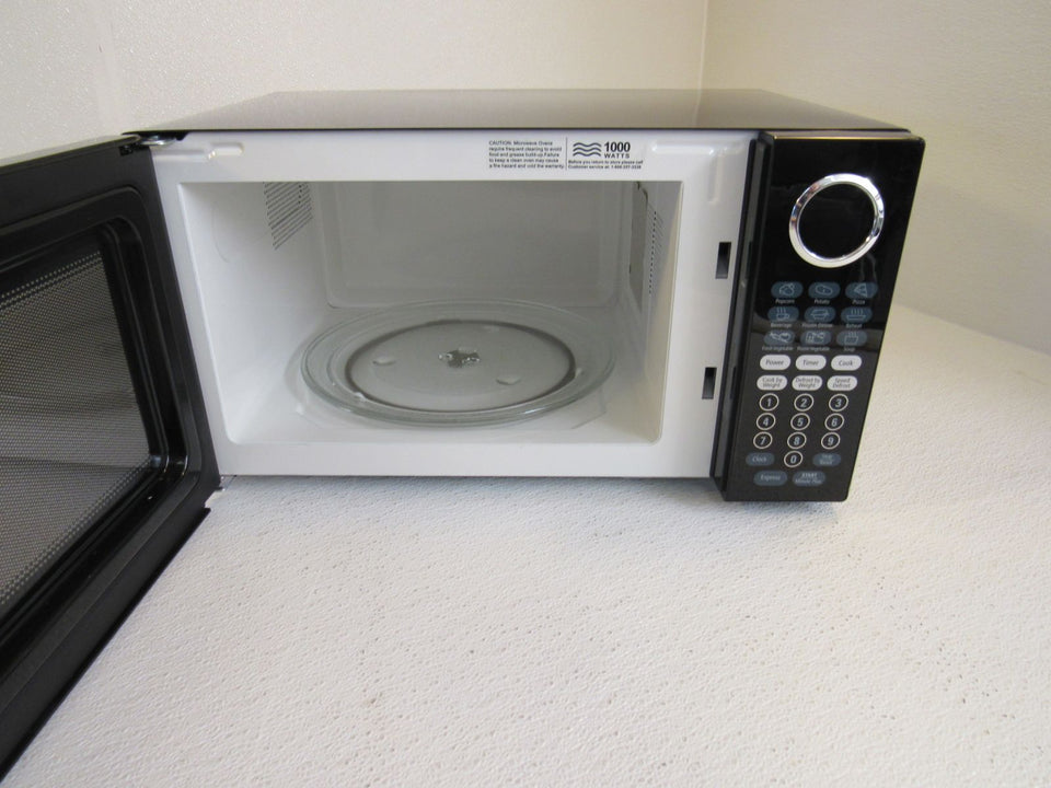 Oster 0.7 Cubic Feet Microwave Oven 700 Watts OGT6701